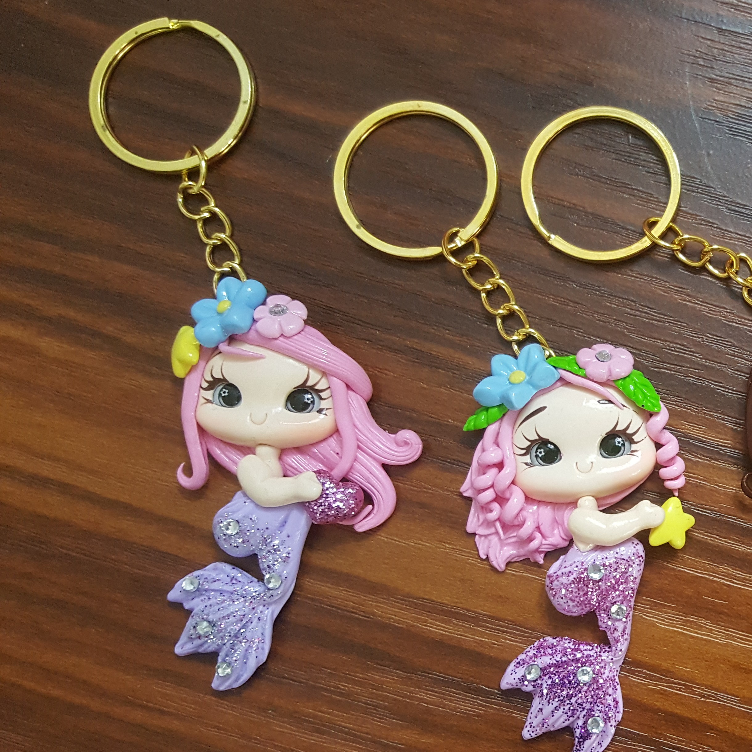 جاکلیدی طلایی پری دریایی قلب دردست