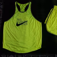 رکابی و شلوارک ورزشی زرد فلور نایک