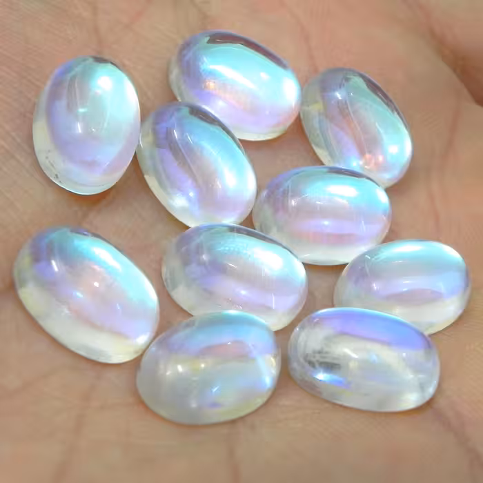 یک عدد نگین اوپالین اوپال سنتتیک هفت رنگ تراش بیضی دامله مناسب انگشتری