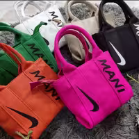 کیف چرم مانی دارای بند بلند قابل تنظیم( ارسال رایگان)