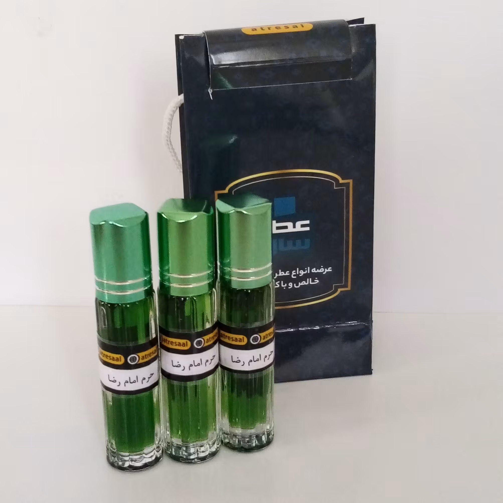 عطر حرم امام رضا علیه السلام در شیشه 4 میلی رولی