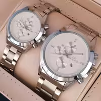 ست ساعت مچی مردانه و  زنانه بند استیل رنگ ثابت طرح سه موتوره 