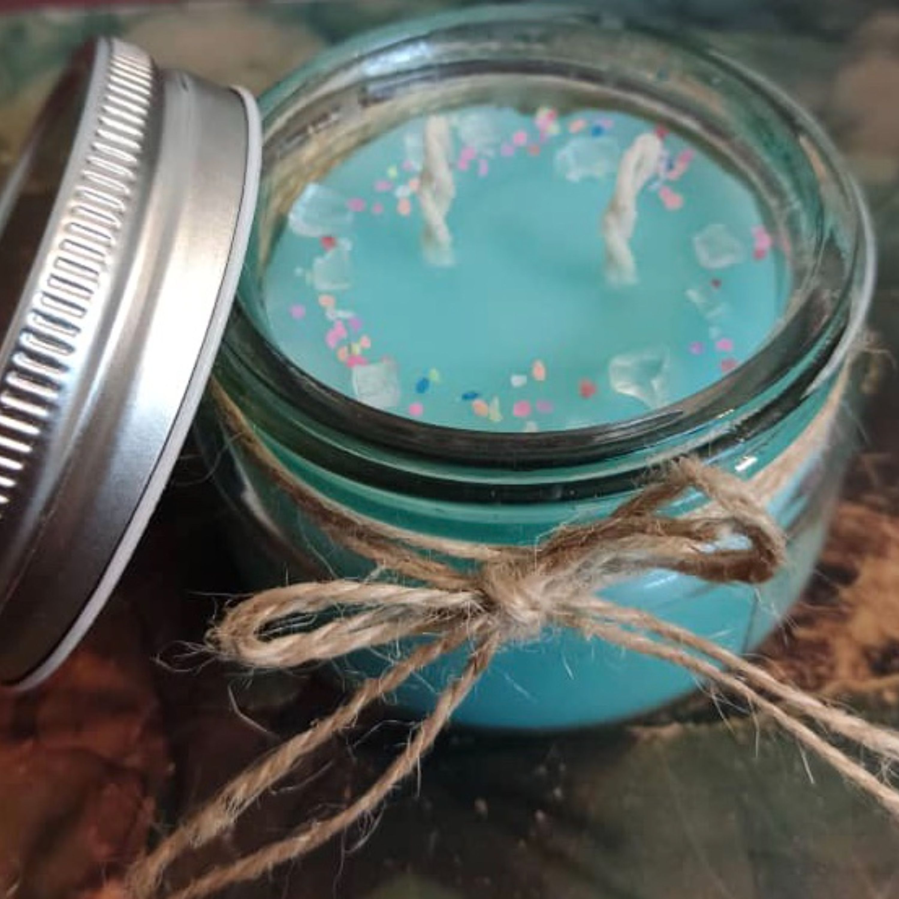 شمع شیشه ای دو فیتیله ای در دار-آبی فیروزه ای