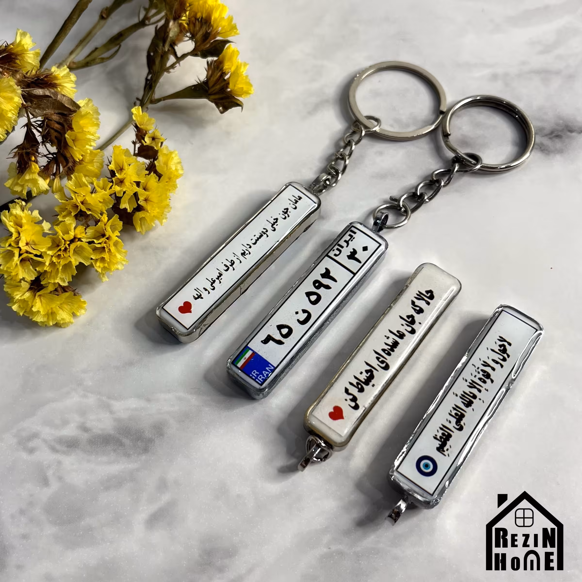 جاکلیدی رزینی با قاب استیل