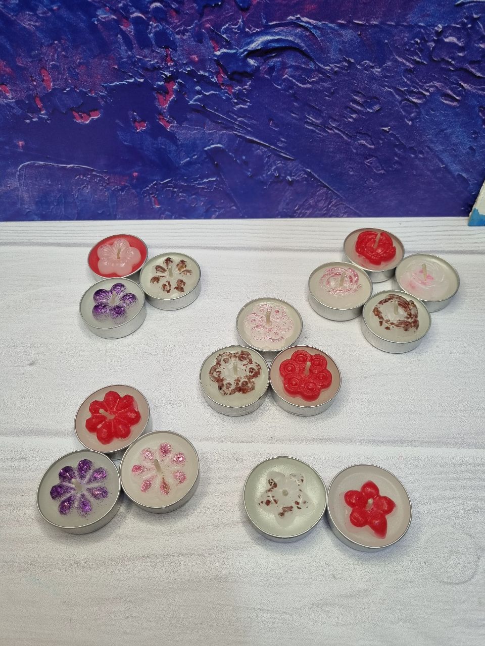 شمع دست ساز طرح وارمر گرد و گل چند رنگ و طرح