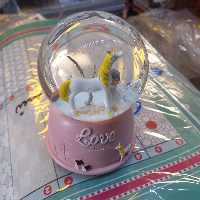 گوی موزیکال برفی عروسکی تک شاخ باطری خور 