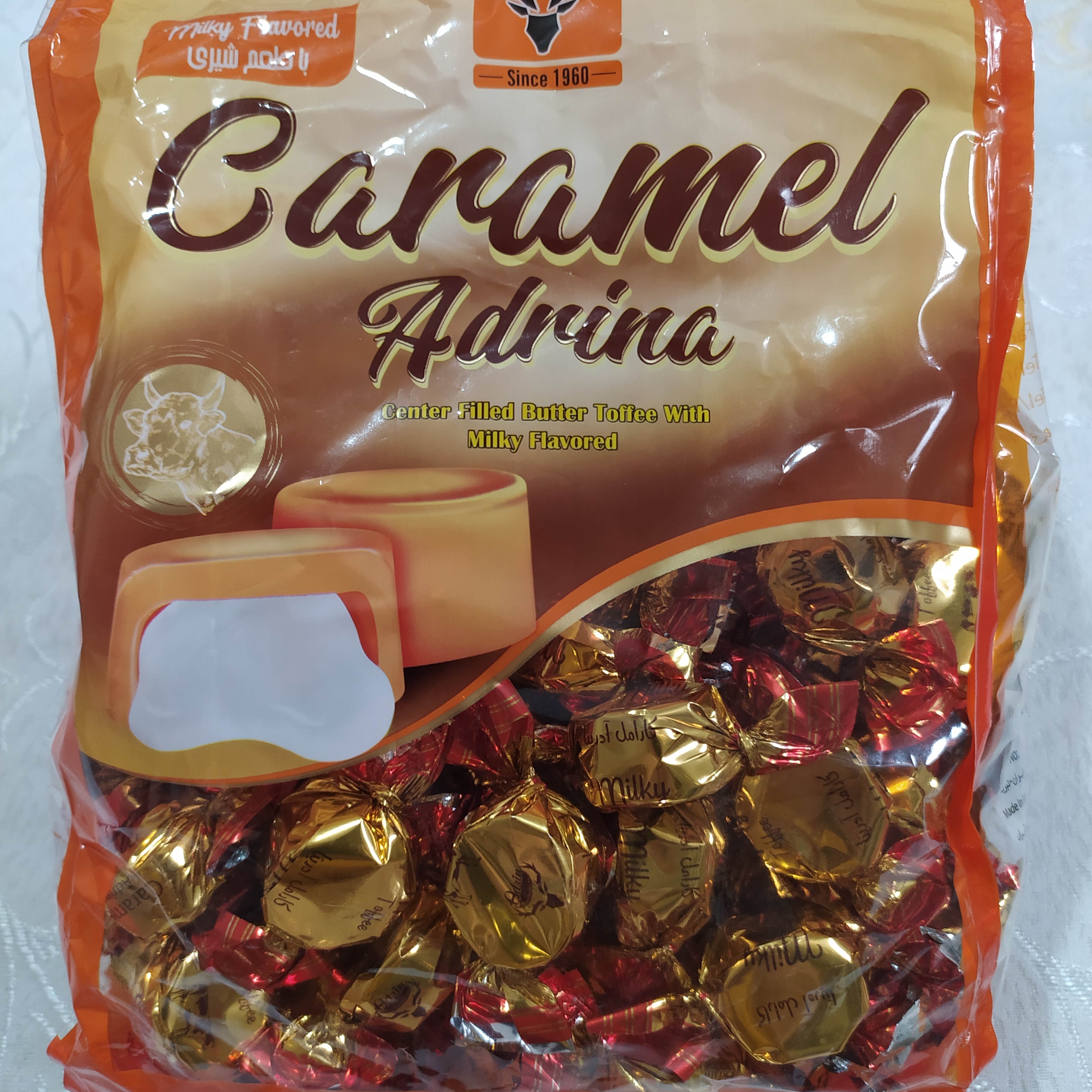 تافی کارامل آدرینا طعم شیری برند آدرین بسته 850گرمی پلمپ شرکتی