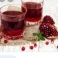 آب انار محصولات طبیعی زیتون