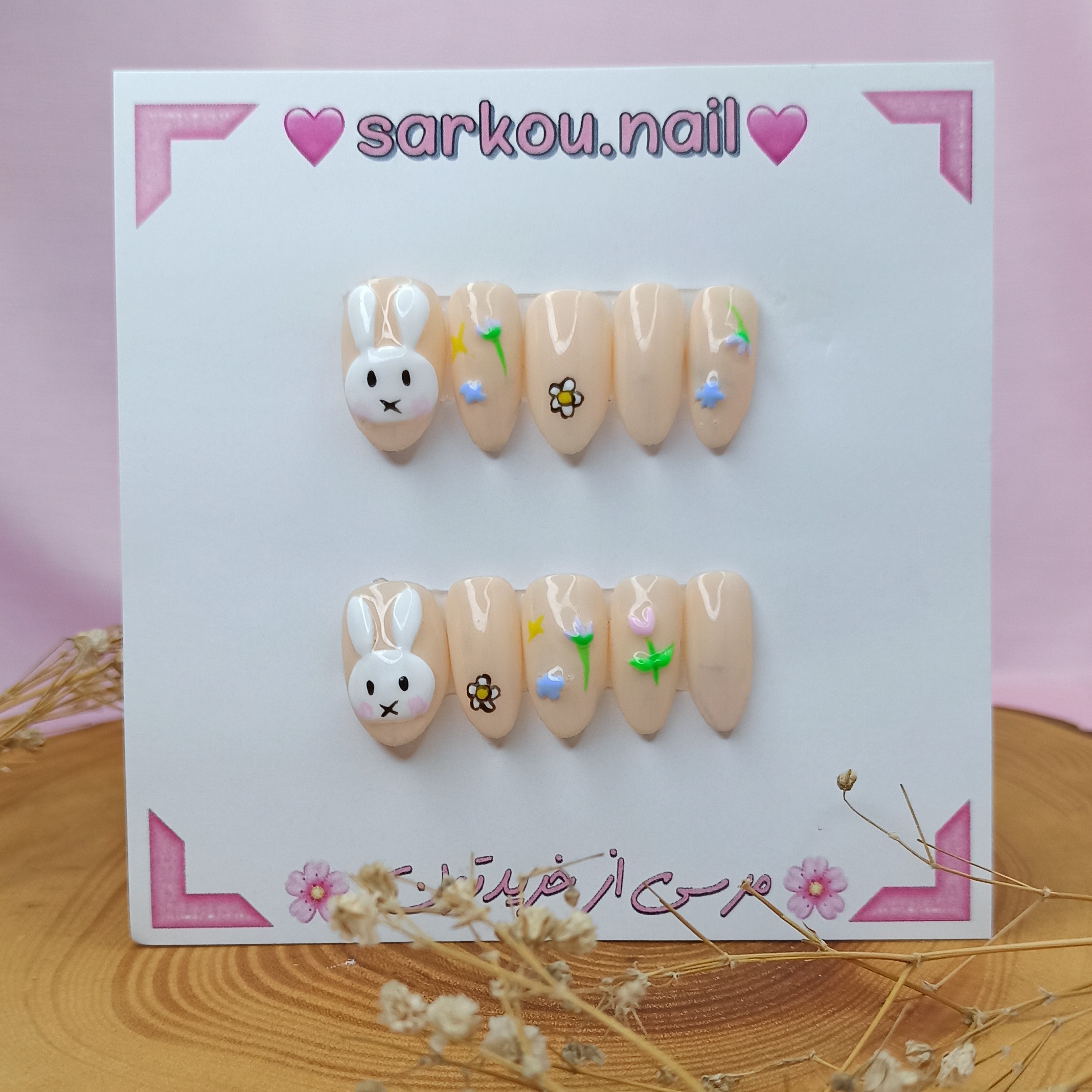 ناخن مصنوعی برجسته  ساخته شده با مواد کاشت طرح خرگوش و گل 