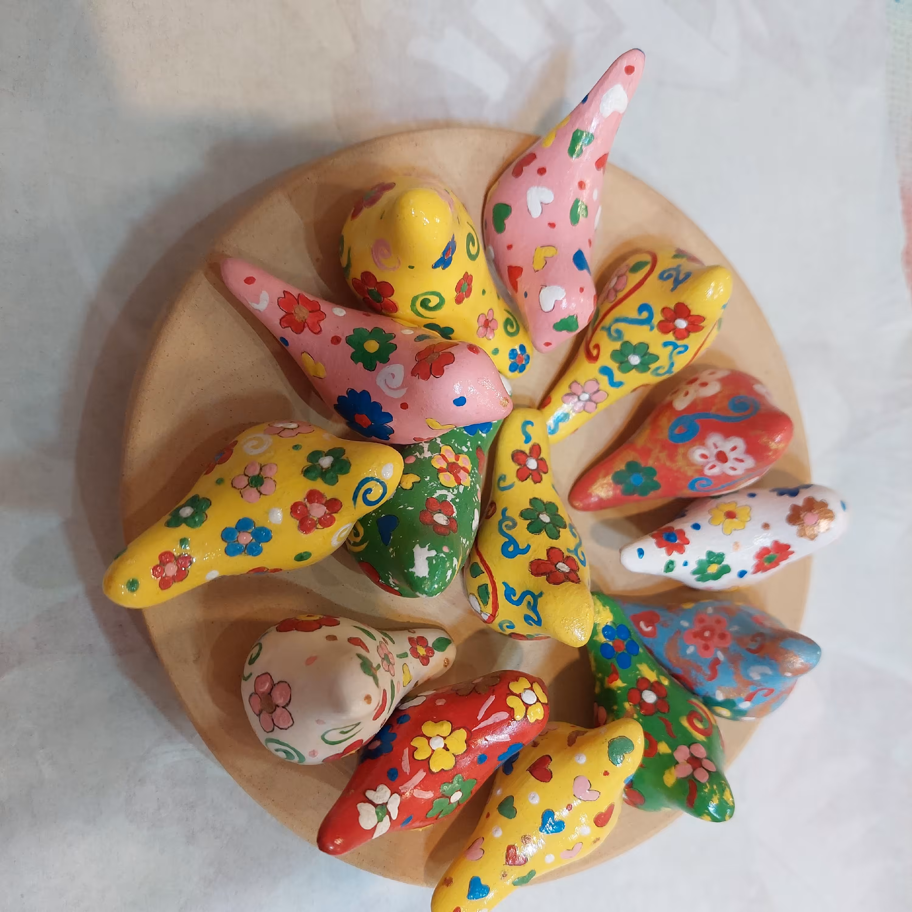 پرنده مرغ آمین بندانگشتی با جنس سرامیک ،بسیار خوشرنگ و زیبا ،دستساز