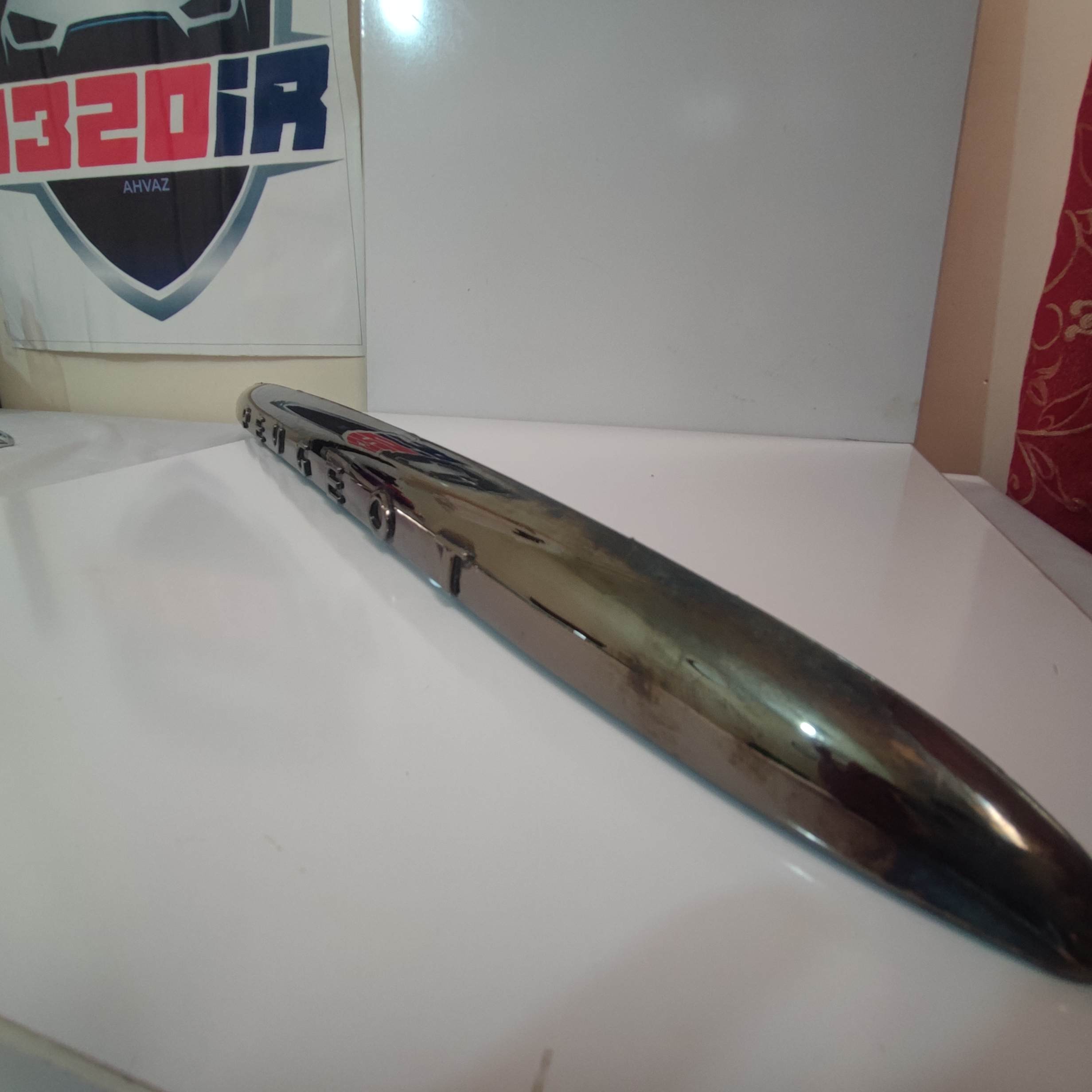 قاب دستگیره صندوق عقب پژو 206 (دستگیره درب صندوق)