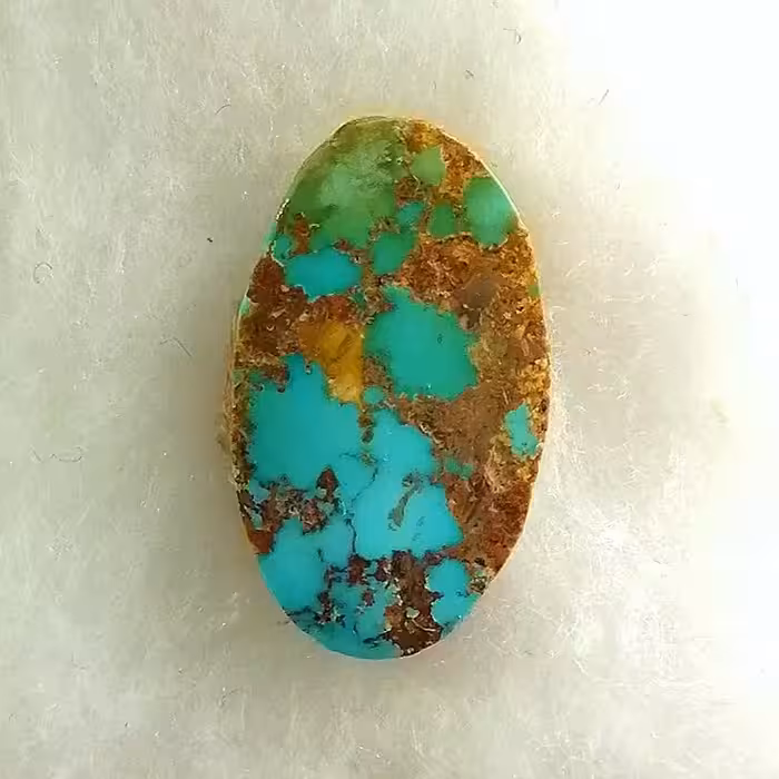 نگین فیروزه نیشابوری رگه طلای اصل بسیار خوشرنگ و خاص و خوش جلا مناسب انگشتر و آویز 