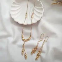 نیم ست طرح طلا مدل کاکوله.کد 165185248.برند استیل.رنگ ثابت.طرح طلا 