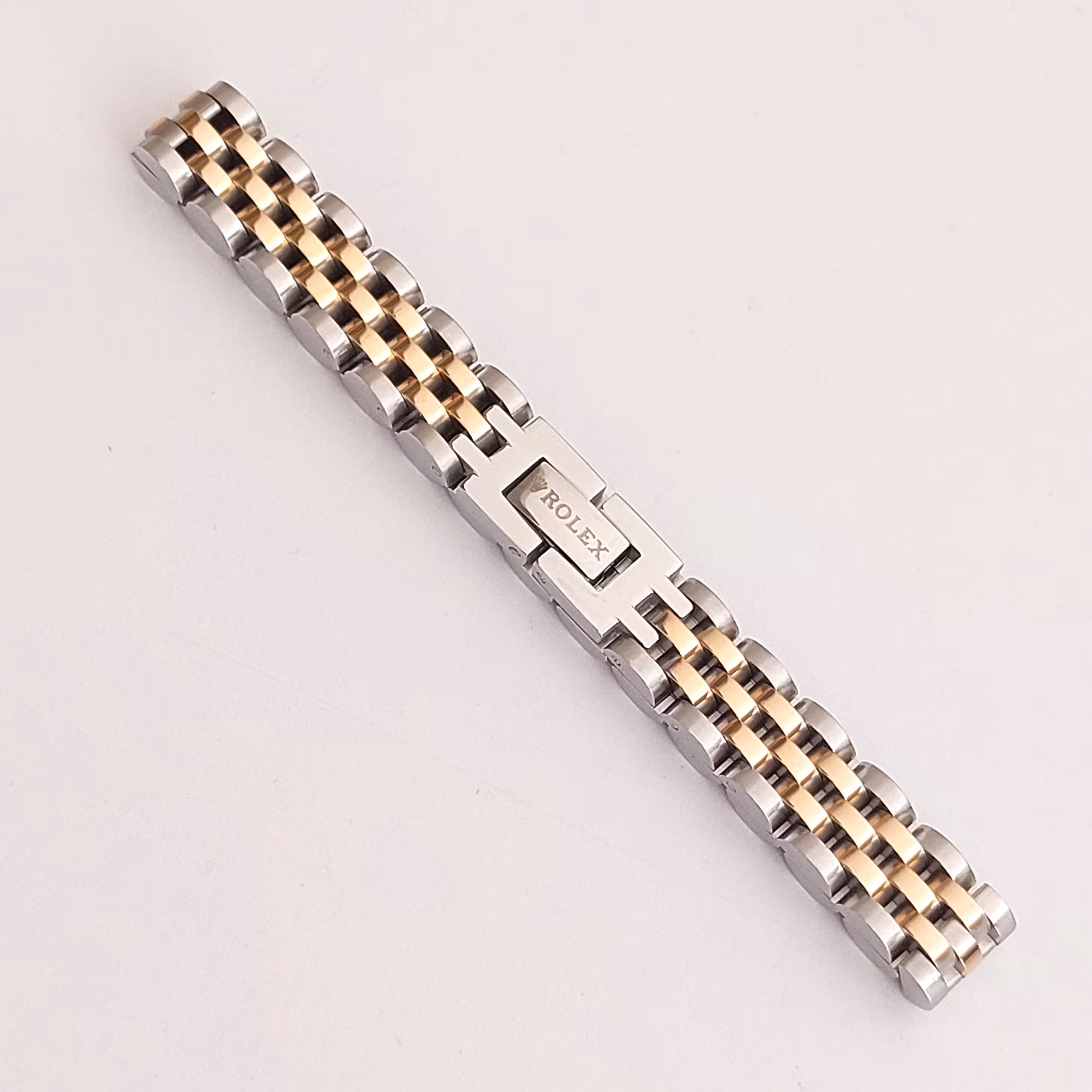 دستبند رولکس  دو رنگ  نقره ای و طلایی 