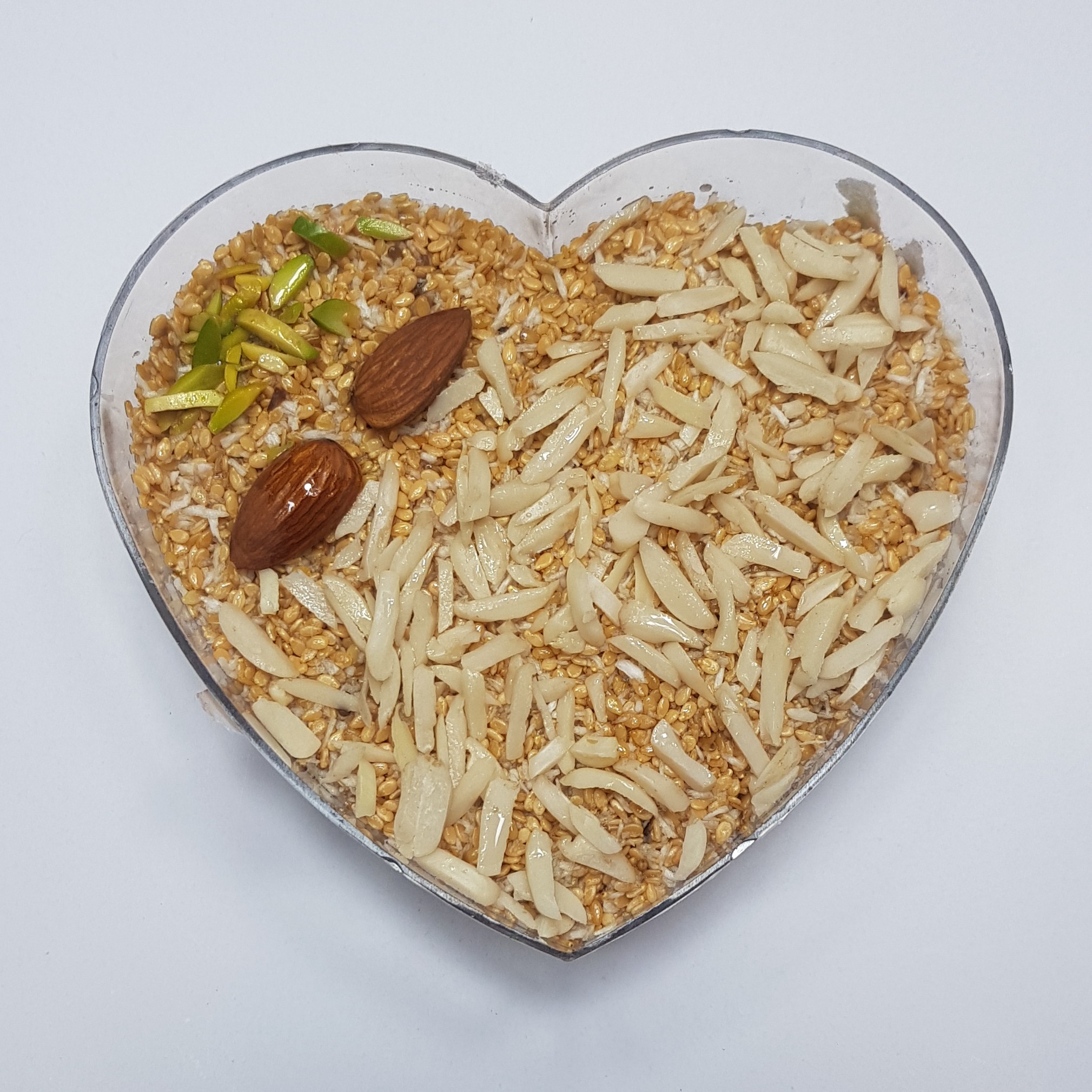معجون کنجد عسلی درجه یک کنجد عسل وانیل خلال بادام و پسته (200گرم)