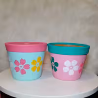 گلدان سفالی هفتی شکل طرح گل و گلبرگ (ست دو تایی )