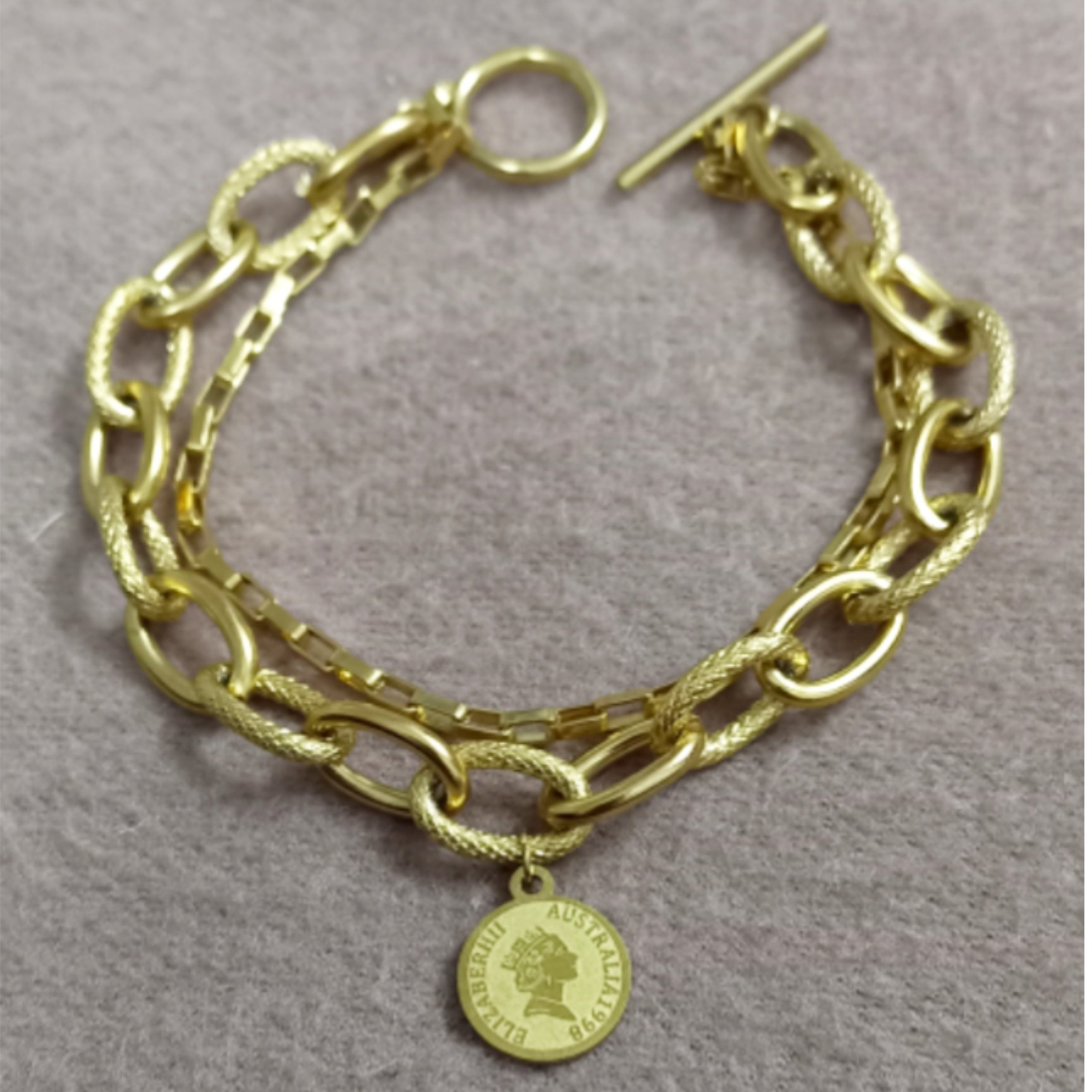 دستبند دولاین استیل رنگ ثابت با پلاک الیزابت و قفل تی 