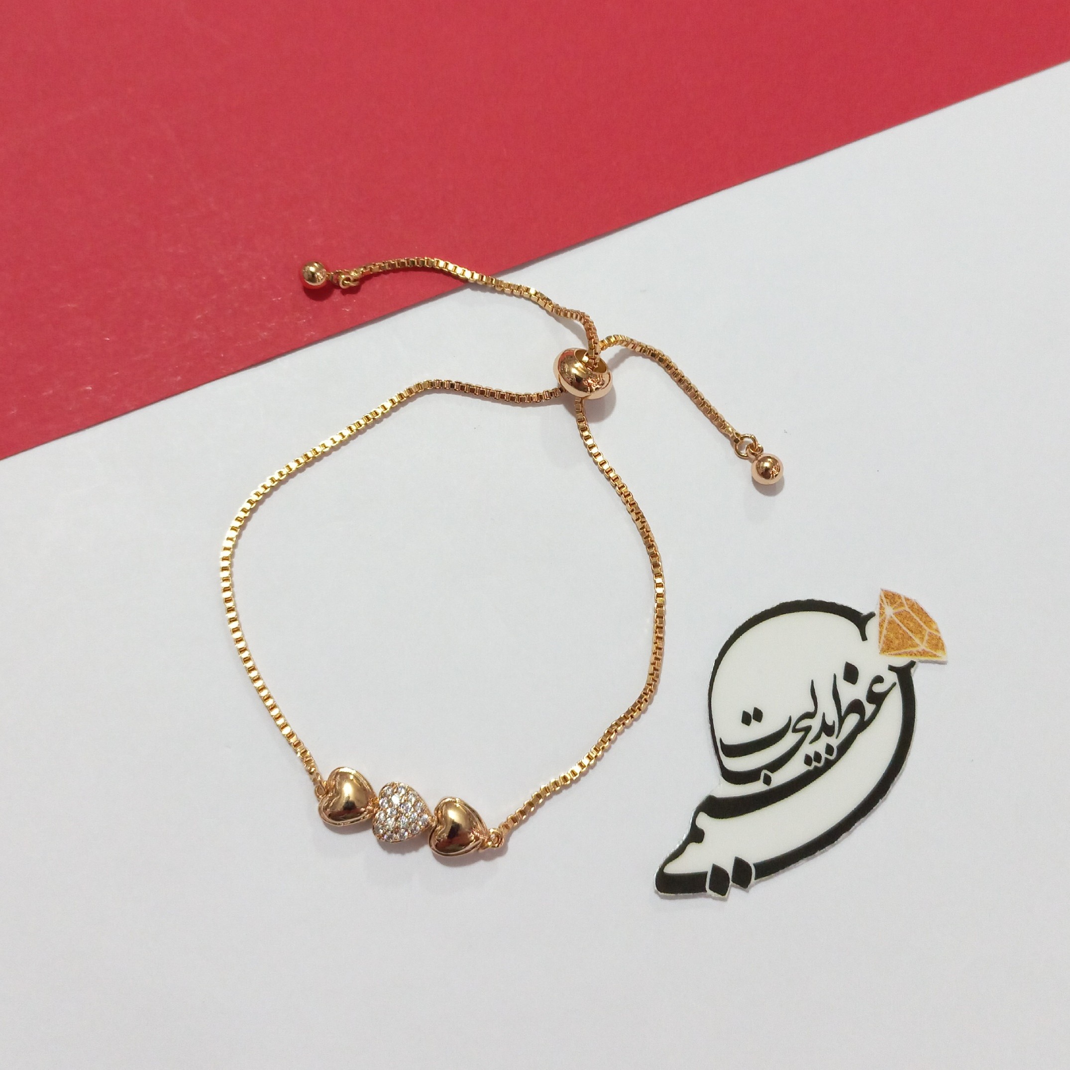 دستبند آسانسوری برند Xuping از جنس مس و روکش طلا درجه یک طرح سه قلب 