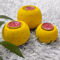 جا شمعی سفالی مدل 3 تکه کروی طرح زرد مناسب شمع وارمر