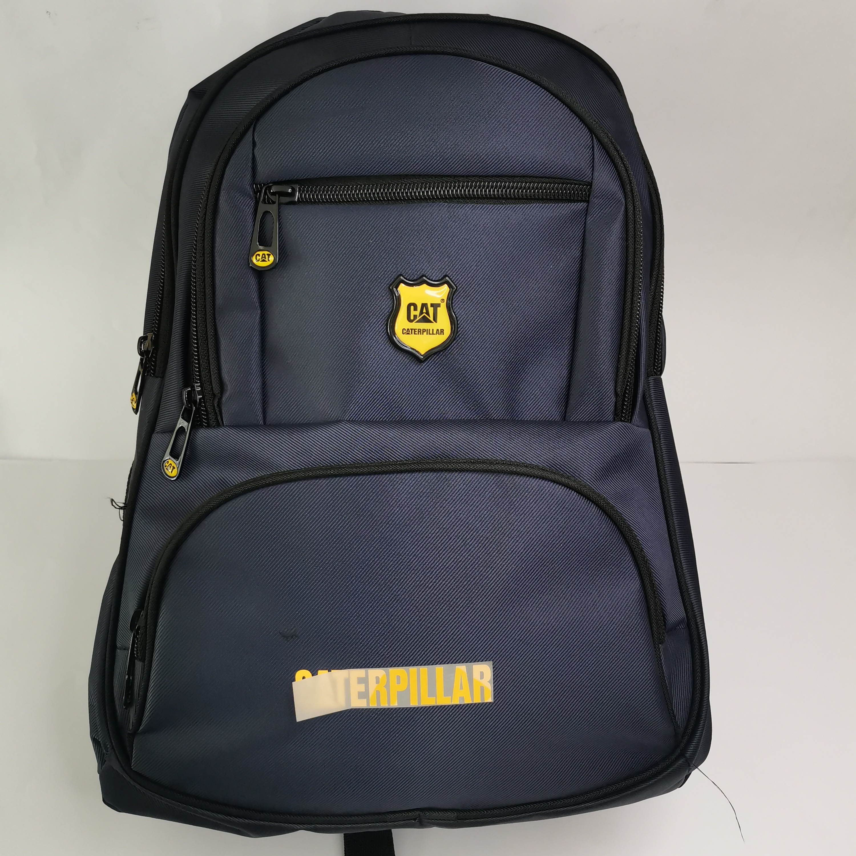 کیف کوله پشتی مدرسه cat برجسته در دو رنگی سورمه ای و مشکی