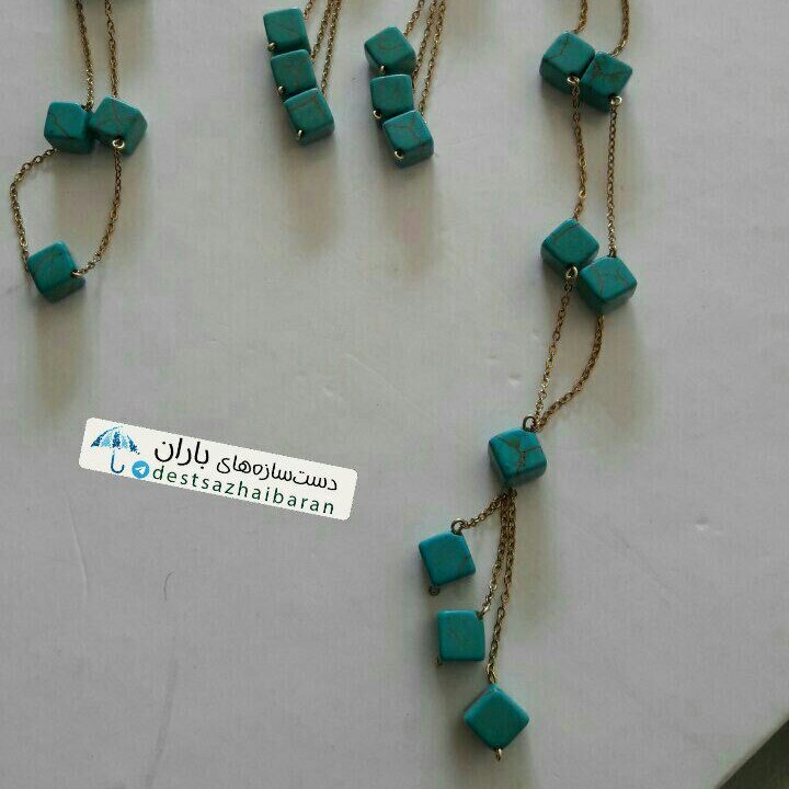 ست گوشواره و رولباسی فیروزه مکعبی رنگ ثابت