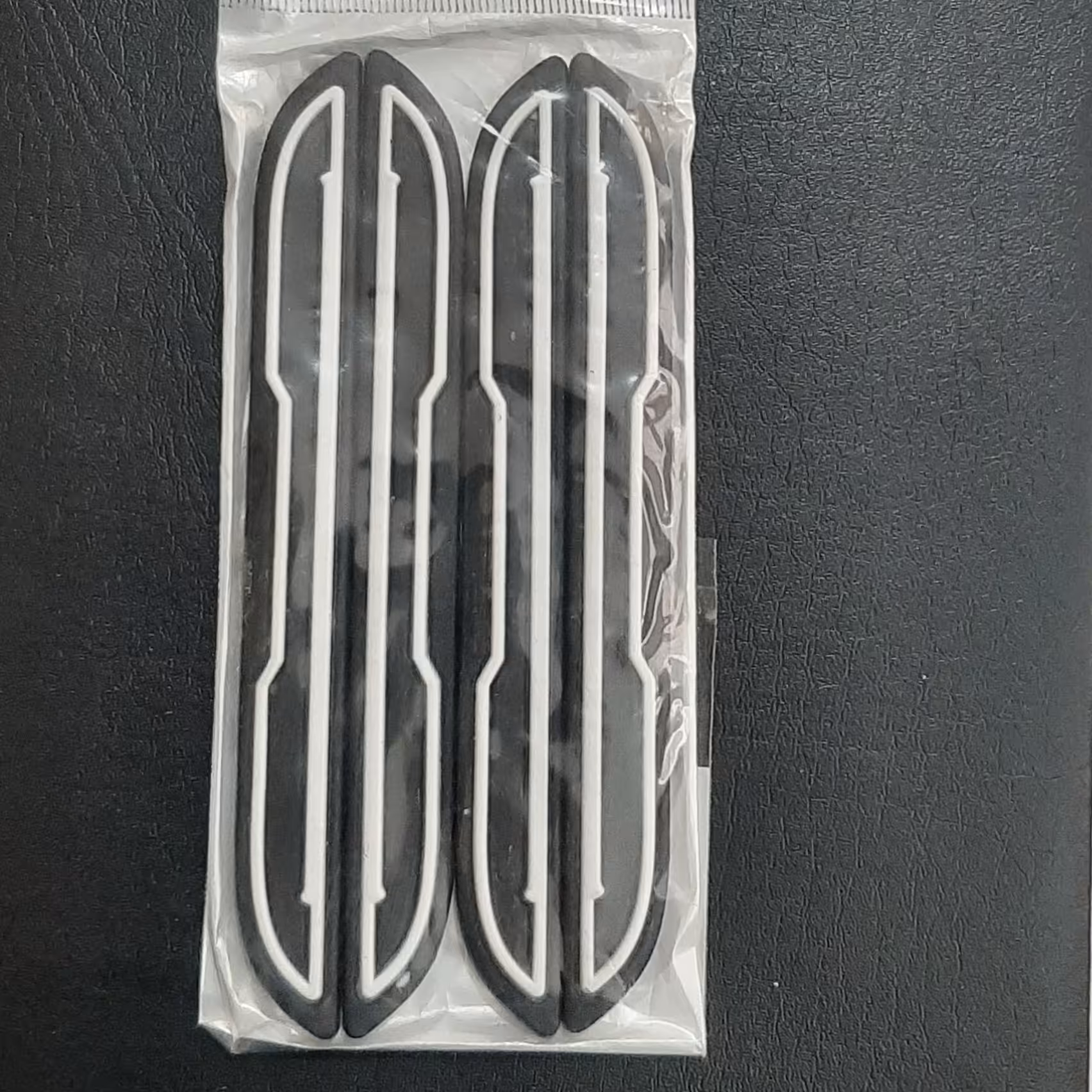 ضربه گیر درب خودرو  مشکی سفید با چسب اضافه ضد کارواش 