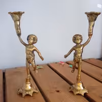 شمعدان بزرگ آدمک برنز وزن 800 گرم