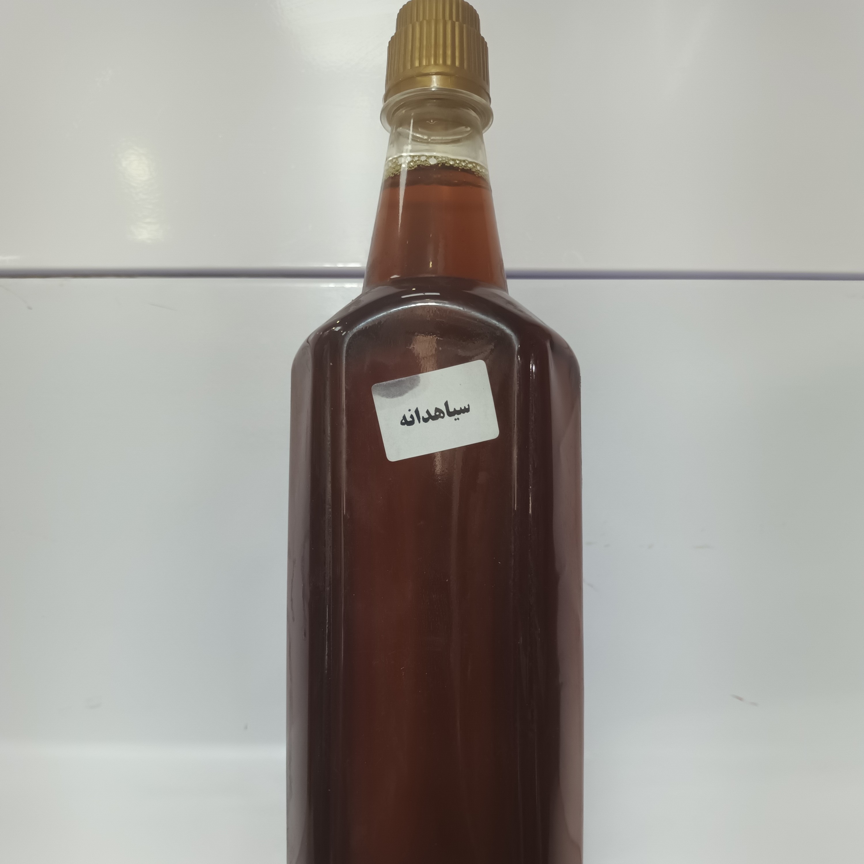 روغن سیاهدانه یک لیتری کلد پرس خالص،  تضمینی و به شرط
