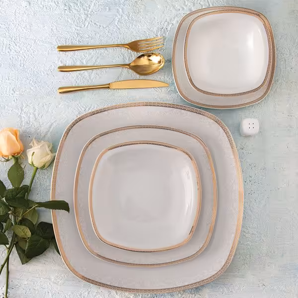 سرویس چینی زرین 12 نفره طرح ریوا طلایی قالب کواترو 98 پارچه