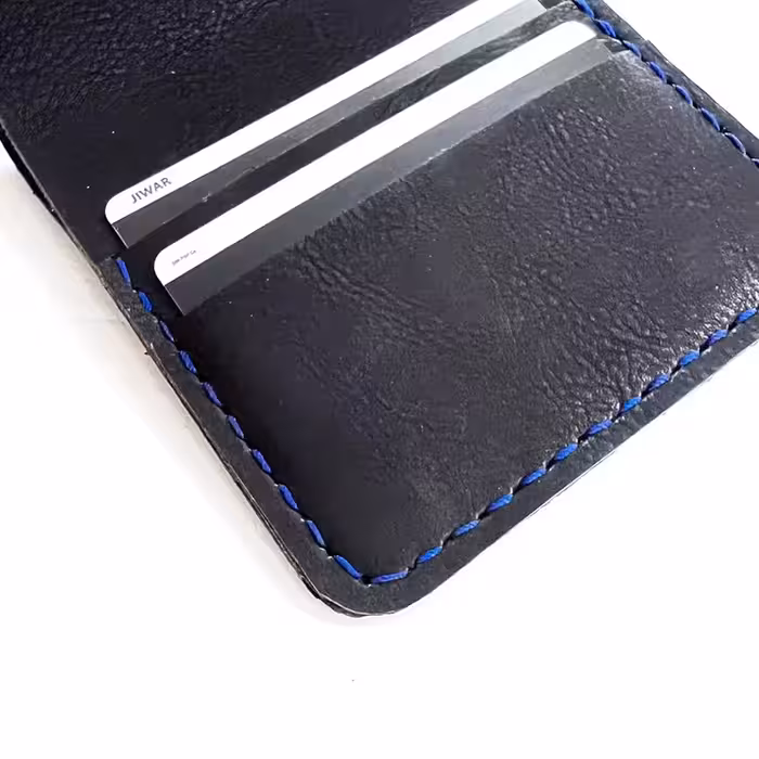 کیفِ پول دست دوز ِ چرم مصنوعی