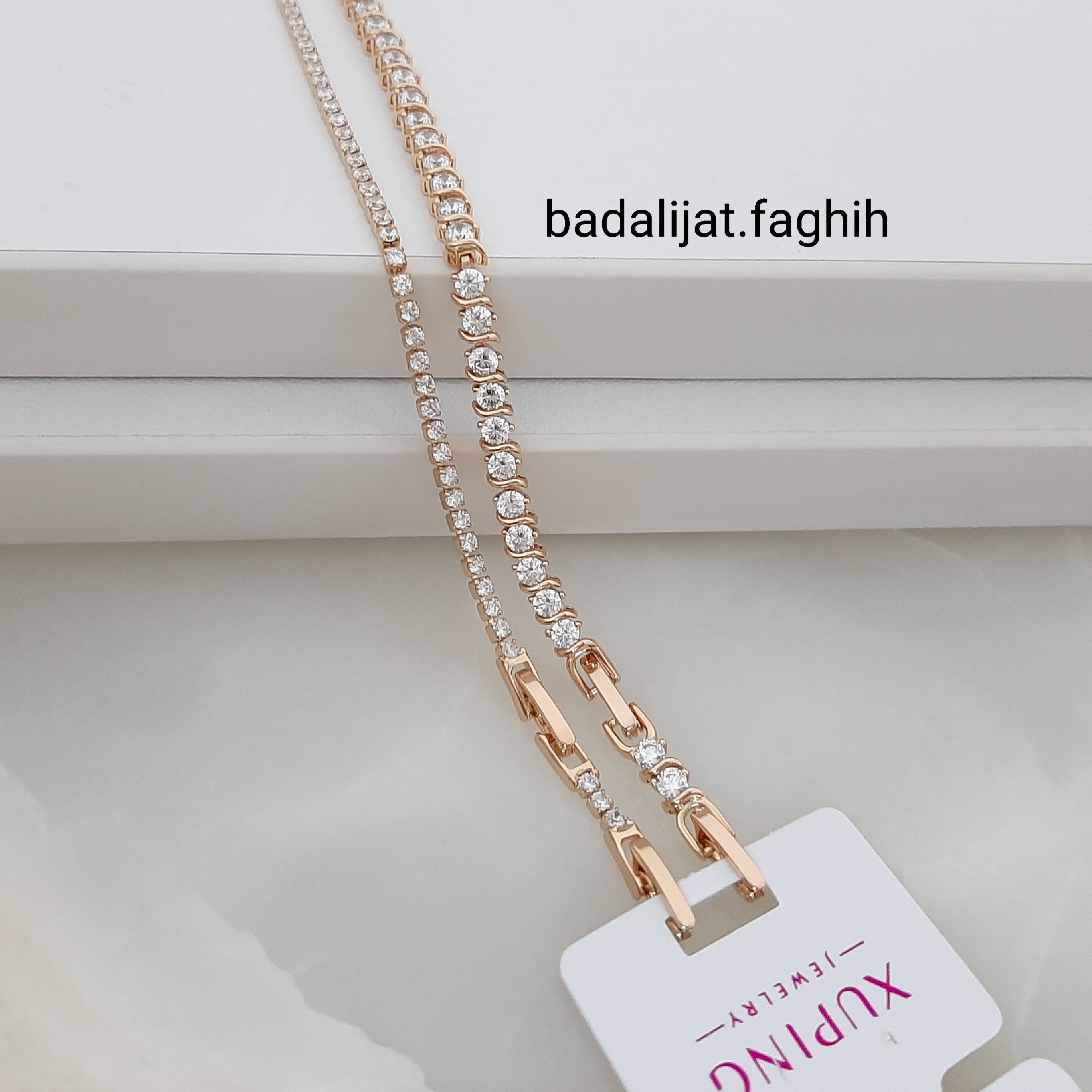 دستبند ژوپینگ تنسی فوق العاده شیک و مجلسی با نگینهای اتمی درخشان ورق بزنید و توضیحات رو بخونید 