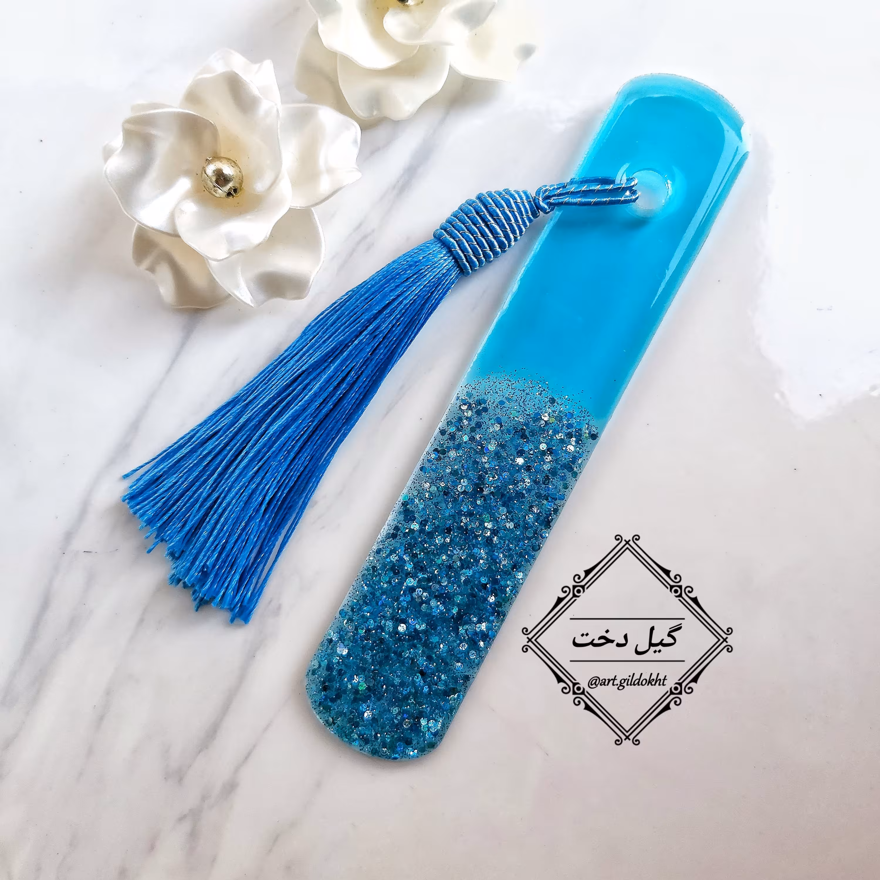 بوکمارک یا نشانگر کتاب رزینی آبی مخصوص کتابخوان ها