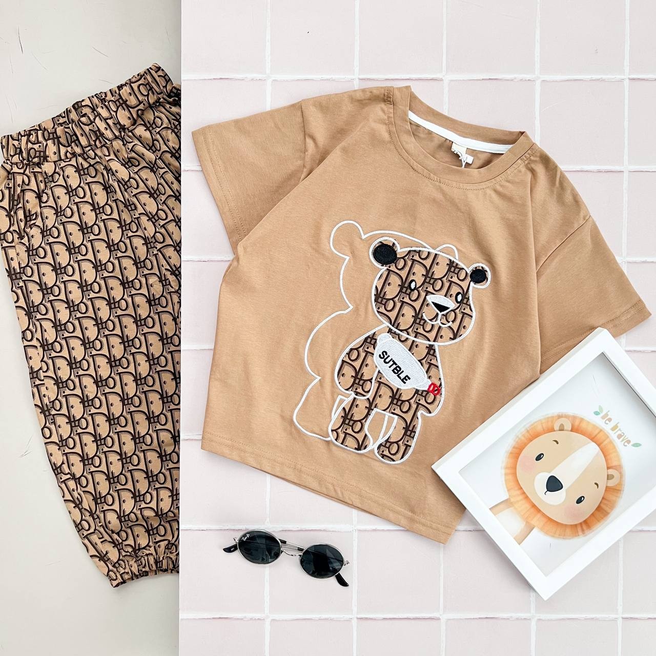 ست اسپورت وارداتی تیشرت شلوارک اسپورت شیک و زیبا مناسب 3 تا 9 سال کیفیت تضمینی دو رنگ کرم و سفید