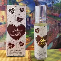 عطر روغنی عربی سفیرالحب قلمی 6 میل رایحه شیرین شکلاتی خوشمزه عودی چوبی 