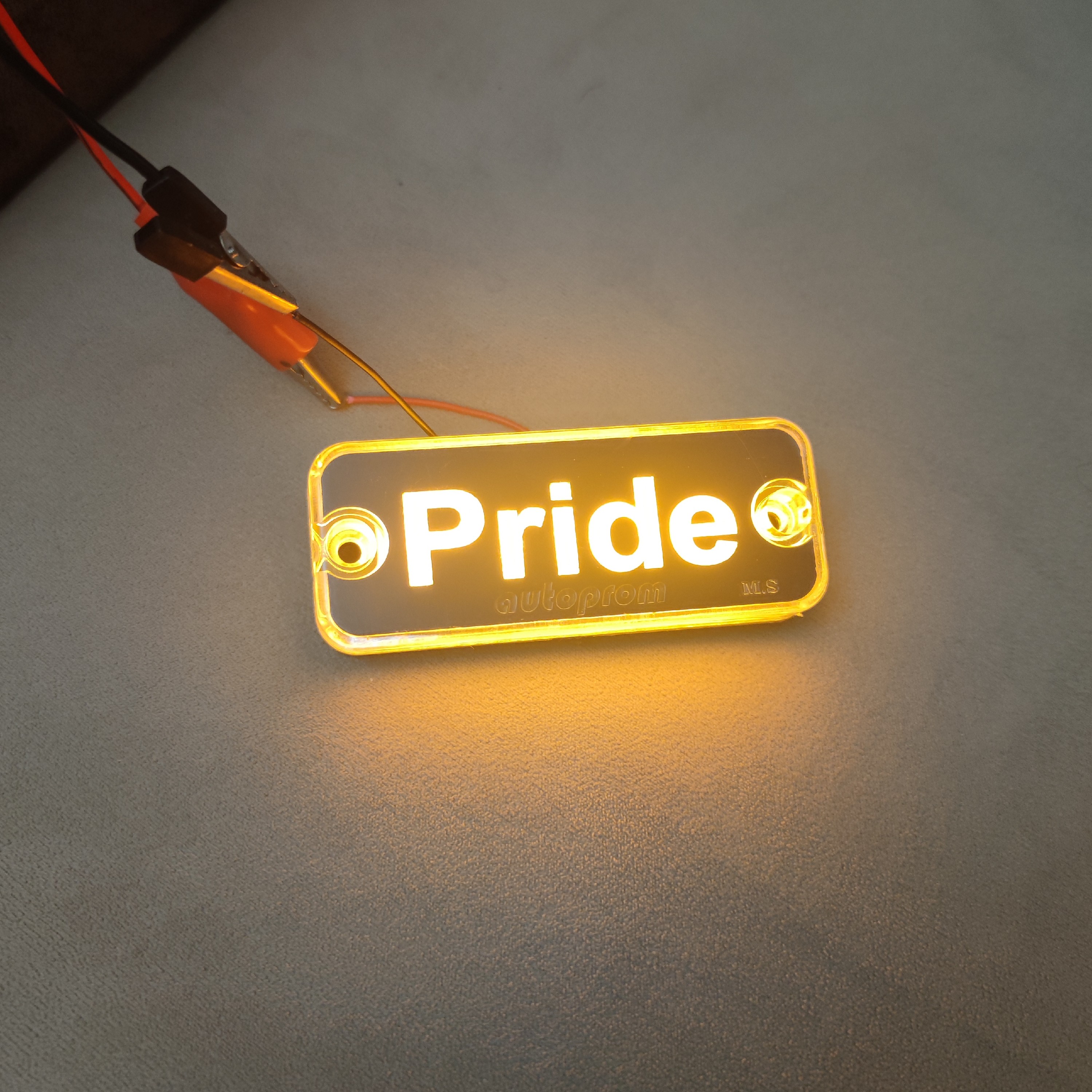 چراغ آرم پراید Pride رنگ نارنجی 12 ولت