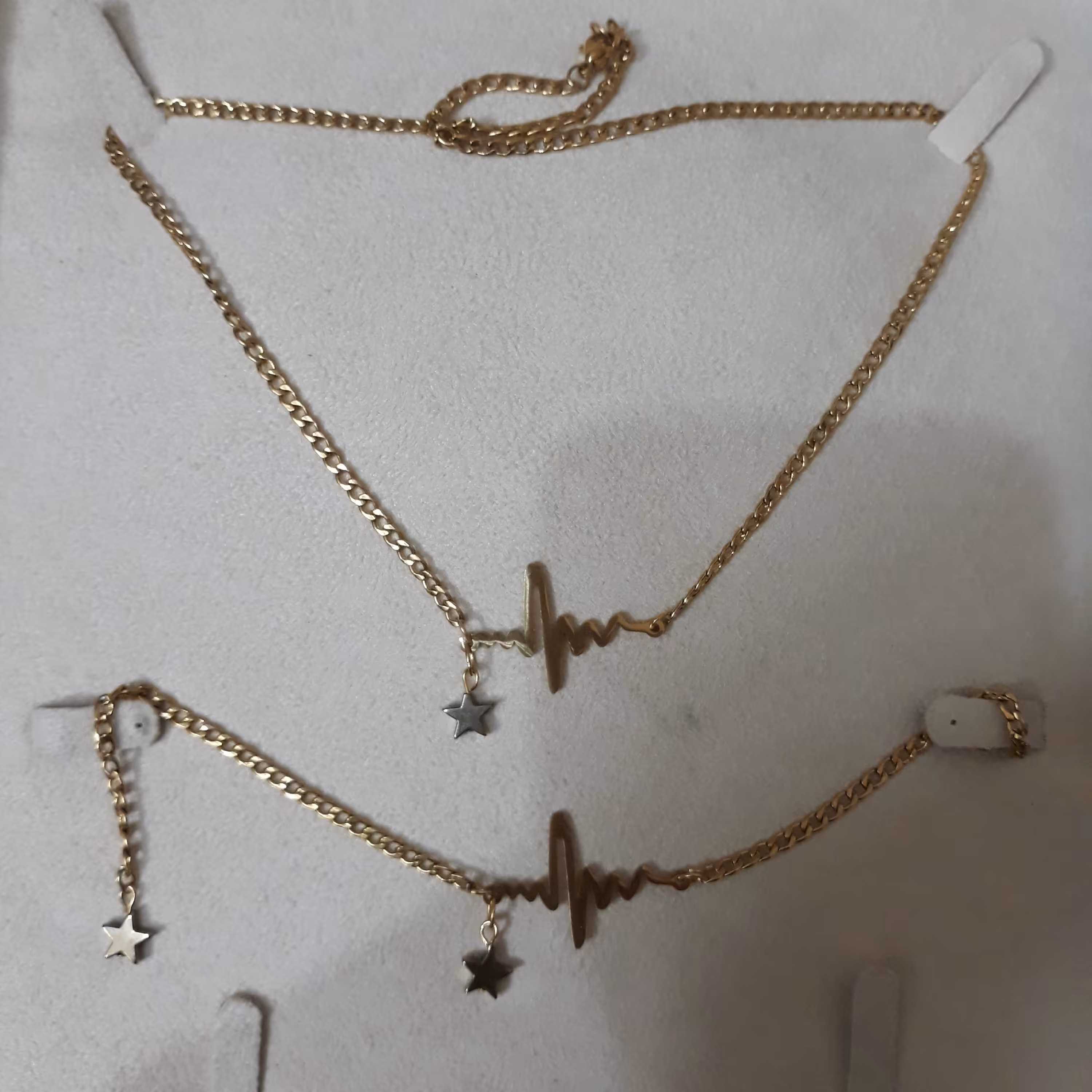 نیم ست دستبند و گردنبند زنجیر کارتیر ظریف پلاک استیل طرح ضربان به همراه اویز ستاره ای