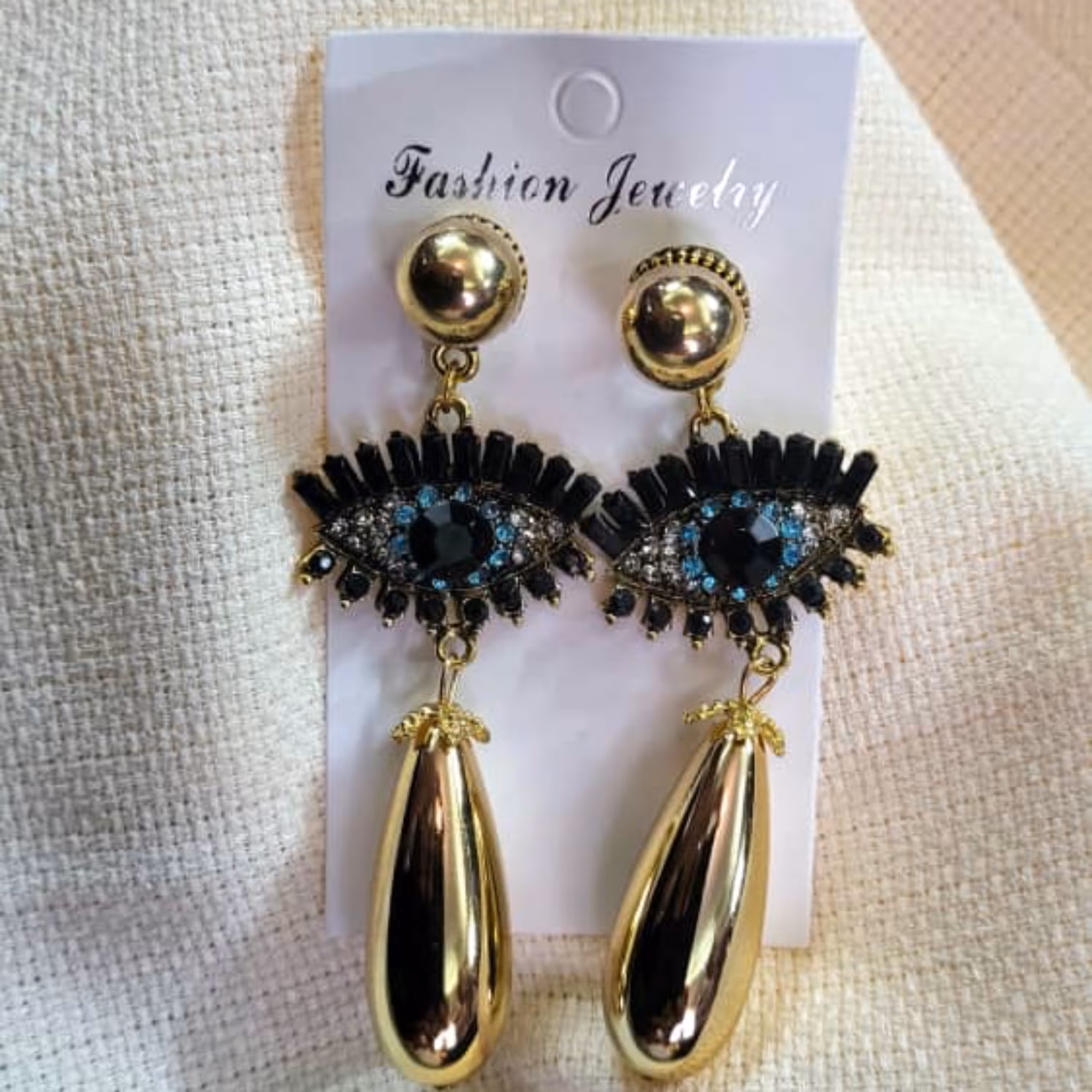 ارسال رایگان گوشواره نگین دار چشم با آویزطلایی