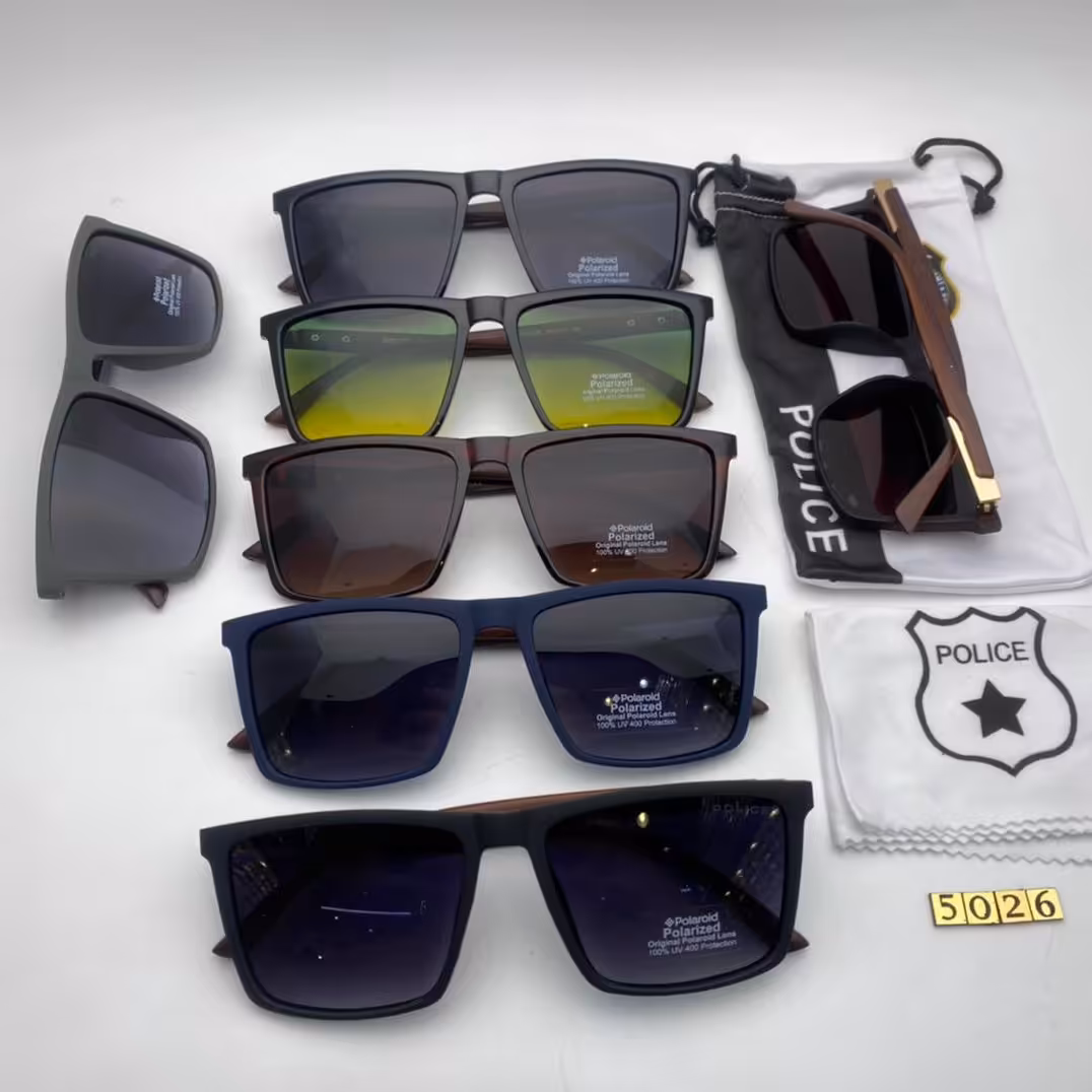 عینک آفتا بی  پلیس دسته چوب کد 5026لاریزه تلق 1/1 ؛همراه با کیسه ودستمال مخصوص پلیس 