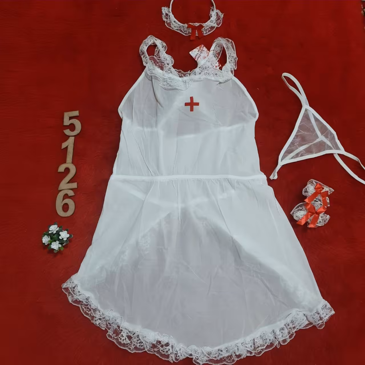 لباس خواب یا کاستوم پرستار توری پشت باز  همراه با تل و شورت و مچ بند کد 5126

