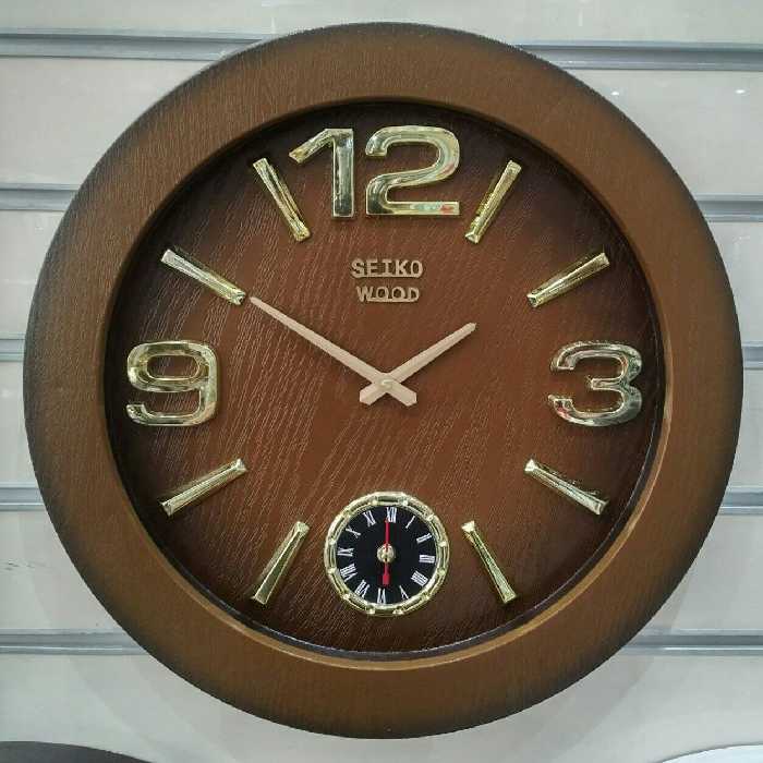 ساعت دیواری سیکو وود موتور آرام گرد، رنگ بندی سفید، قهوه ای جنس بدنه. پلاستیک، قطر 55،