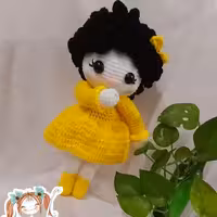 عروسک بافتنی دختر مو فرفری 