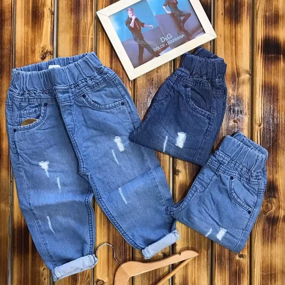 شلوار مام استایل اسپورت کمر محصول تمام کش بسیار راحت در دو رنگ آبی تیره و یخی  اسپرت مناسب دختر و پسر