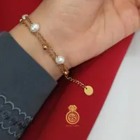 دستبند دولاین مروارید پرورشی و توپی استیل دستساز