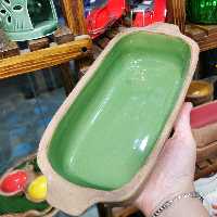 ظرف مستطیلی دست ساز دفرمه. طرح چوبی داخل لعاب رنگی 