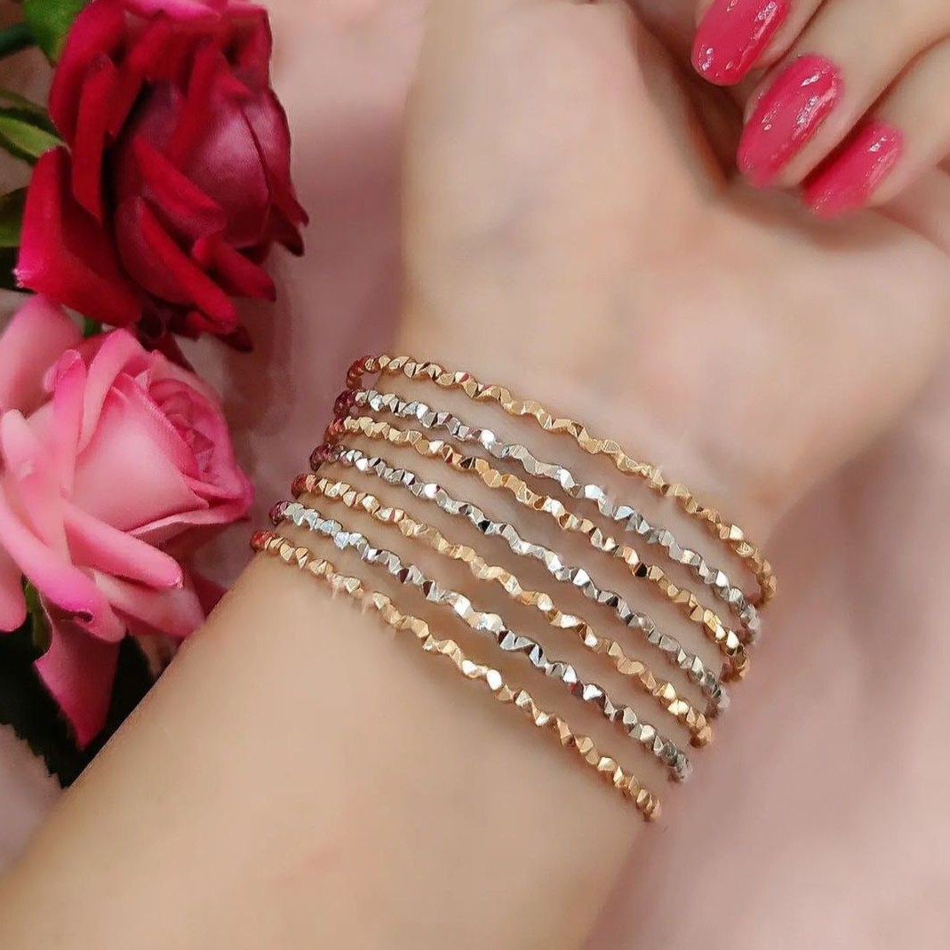 النگو استیل پک هفت عددی کد195 رنگ ثابت دو رنگ کیفیت عالی کپی طلا سایزیک تا چهار موجود