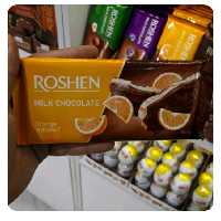 شکلات تخته ای روشن شیر شکلات با مغز نوقا پرتقالی90گرمی