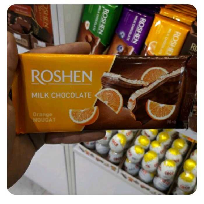 شکلات تخته ای روشن شیر شکلات با مغز نوقا پرتقالی90گرمی