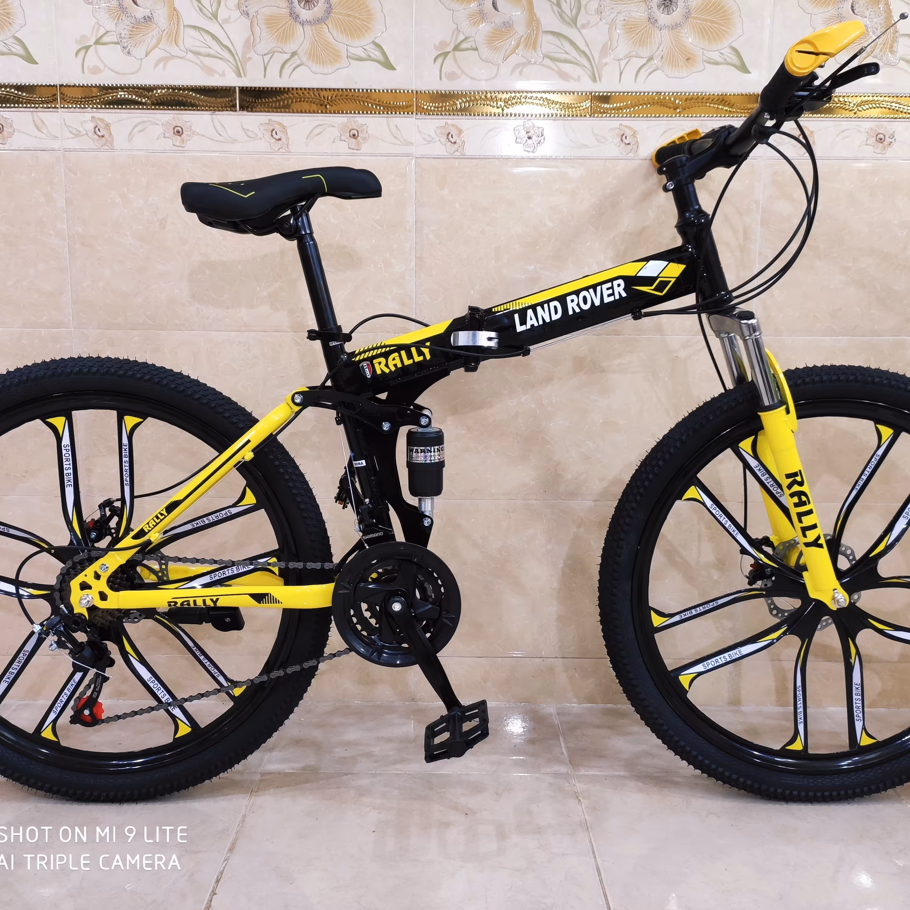 دوچرخه تاشو سایز 26 ،24 و 27  لندرپر LAND ROVER  رنگ مشکی زرد  شرکت RALLY