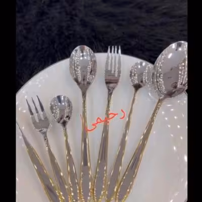 سرویس قاشق و چنگال 12نفره 59 پارچه نیمه طلایی یونیک دور نوار طلایی