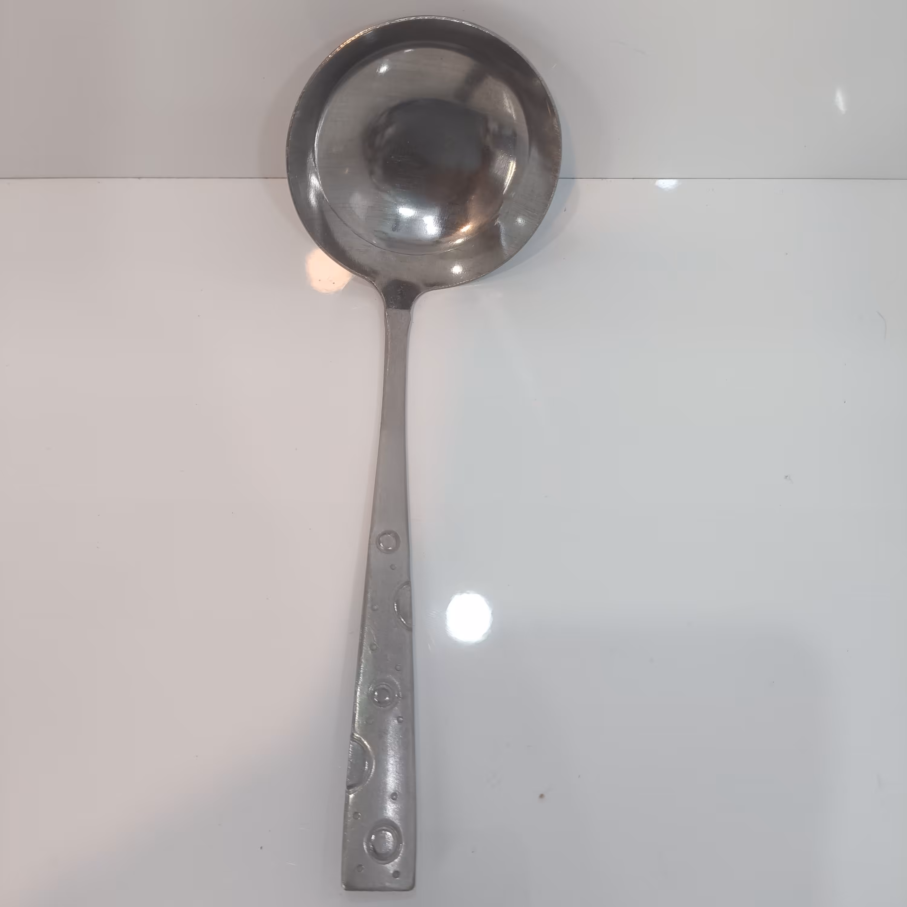 ملاقه فلزی کوچک طرح توپی ضخیم ولی درجه دو 